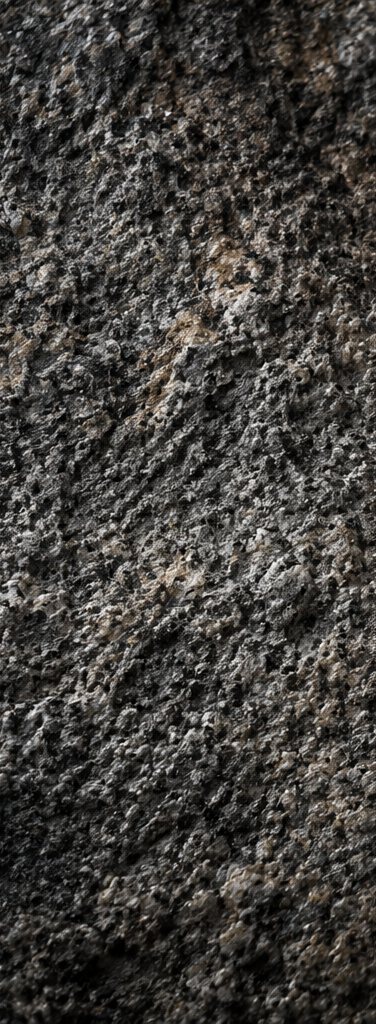 Close detail of a weathered fieldstone face