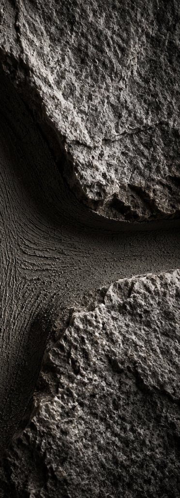 Close detail of a tooled mortar joint between two stones