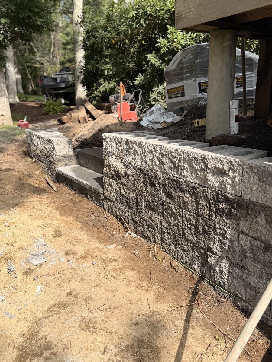 The wall and steps from the driveway side