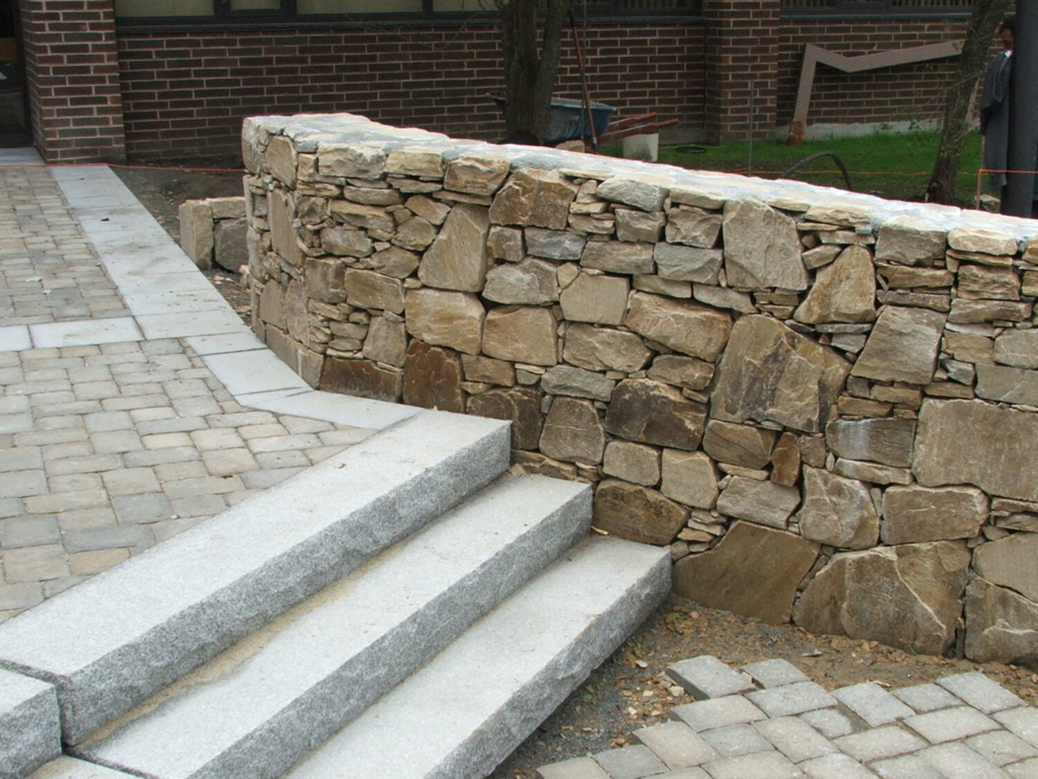 Stone wall with granite steps